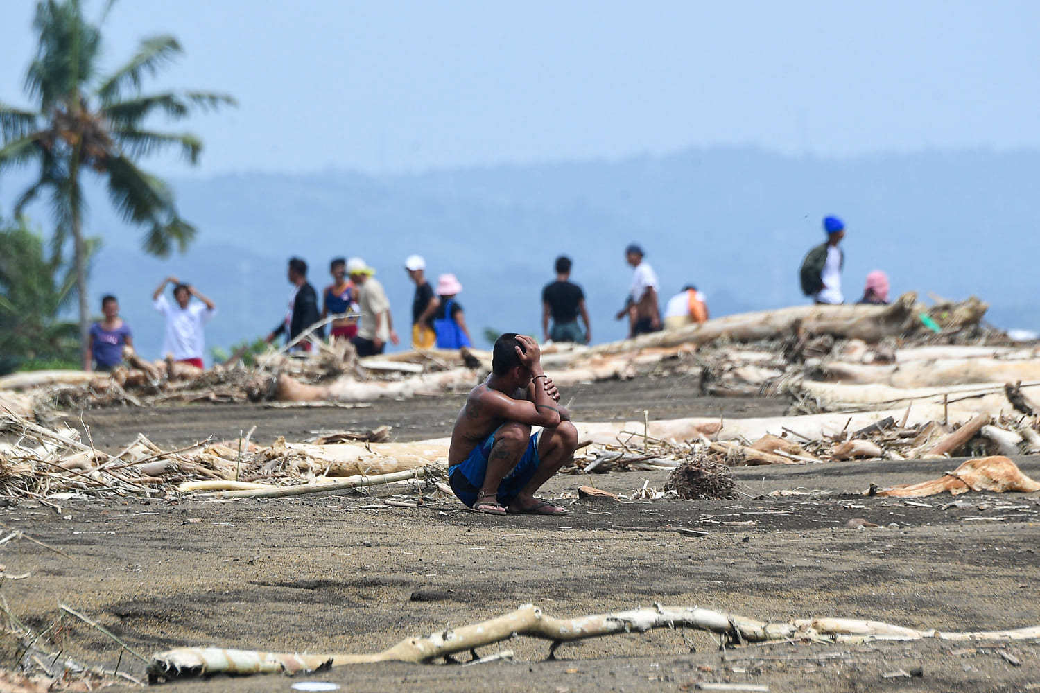 At least 126 dead and missing in massive flooding and landslides in Philippines