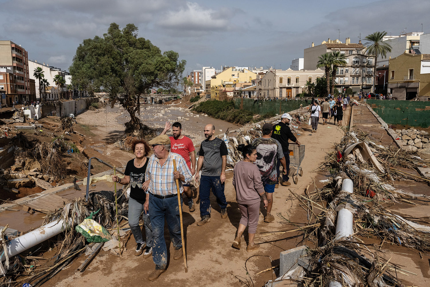 Flood survivors say regional Spanish officials waited too long to warn them of the danger