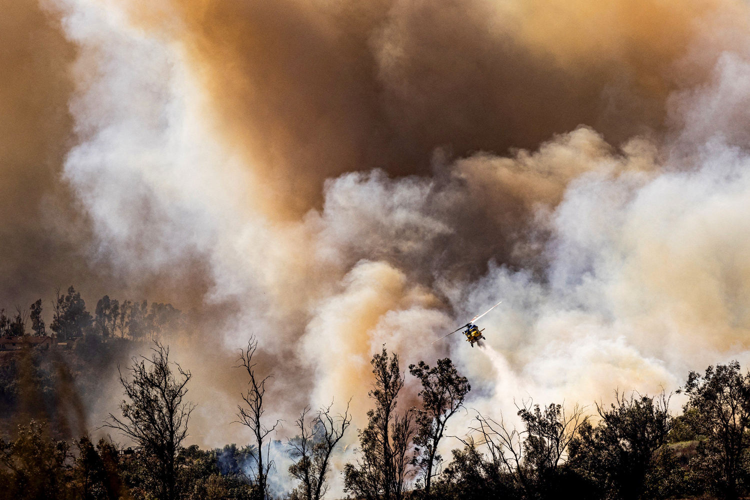 Fires trigger red flag warnings in Northeast as crews continue to battle California blaze