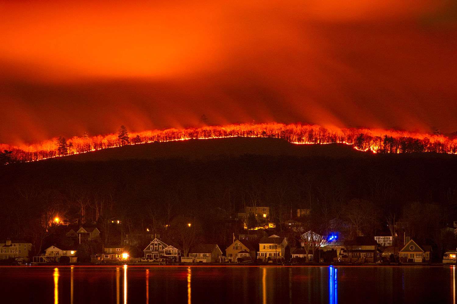 Parched fields and damaging blazes: The Northeast drought and wildfires in photos