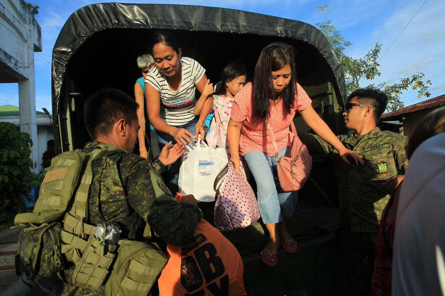 Latest typhoon lashes the Philippines, causing tidal surges and displacing massive numbers of people