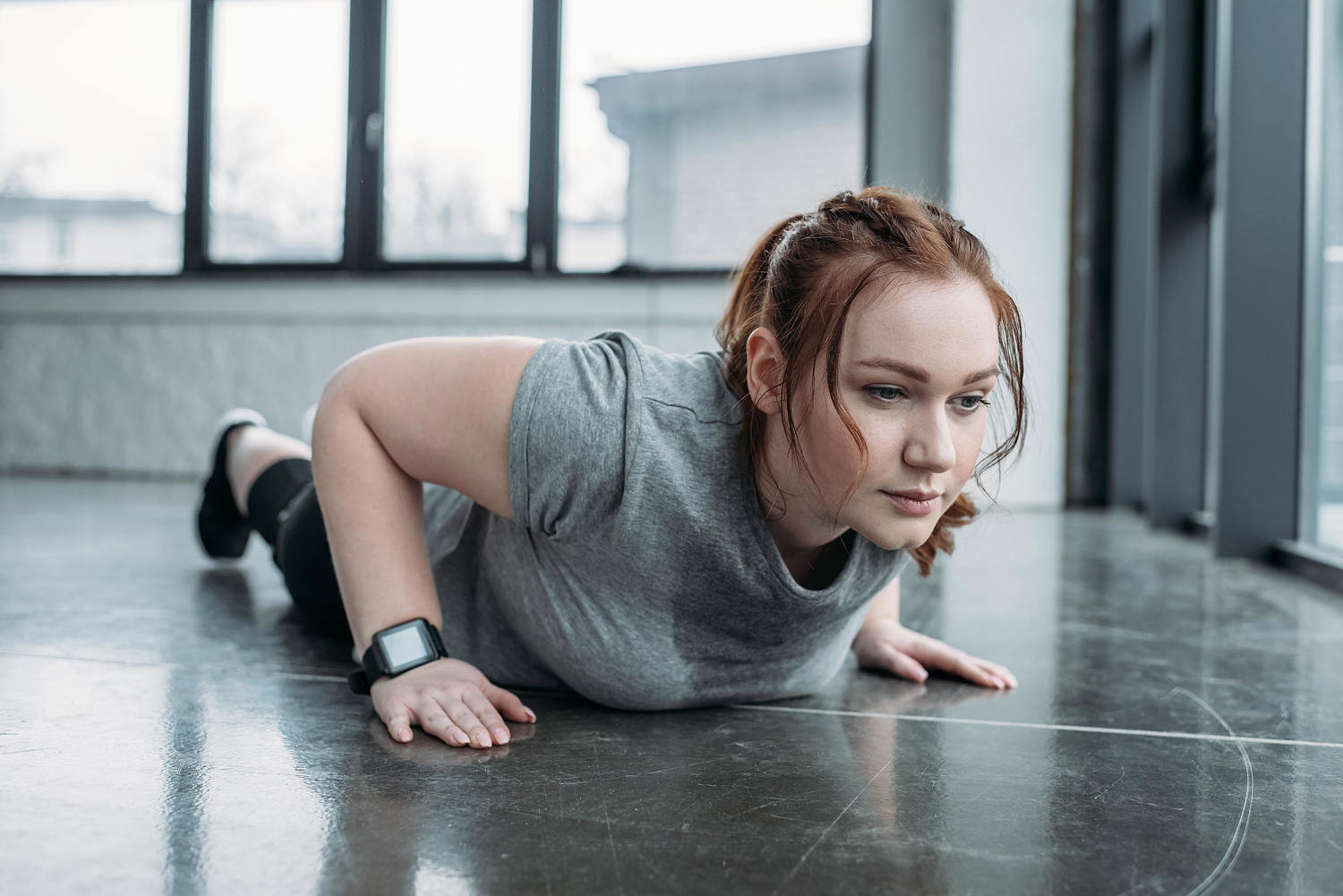 Burpees are hard. A personal trainer shows us how to make the dreaded exercise easier