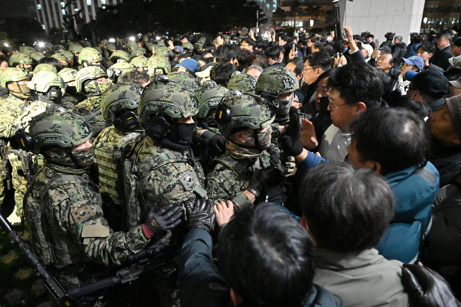 South Korean president declares martial law that is immediately opposed by parliament