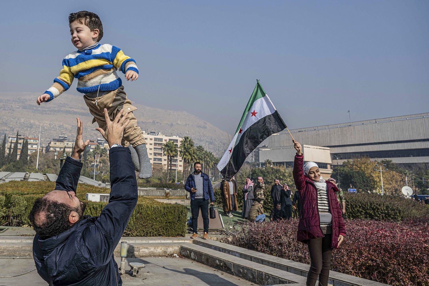 Syrians celebrate in the streets after Assad government falls