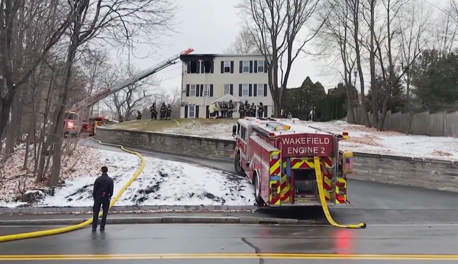 Woman dies after being pulled from Massachusetts house fire; man expected to survive