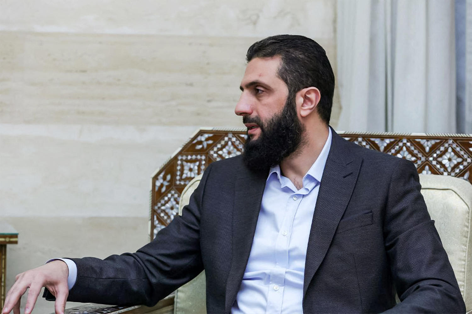 He toppled a dictator and traded fatigues for a suit — Syria's new leader tries to reassure the U.S.