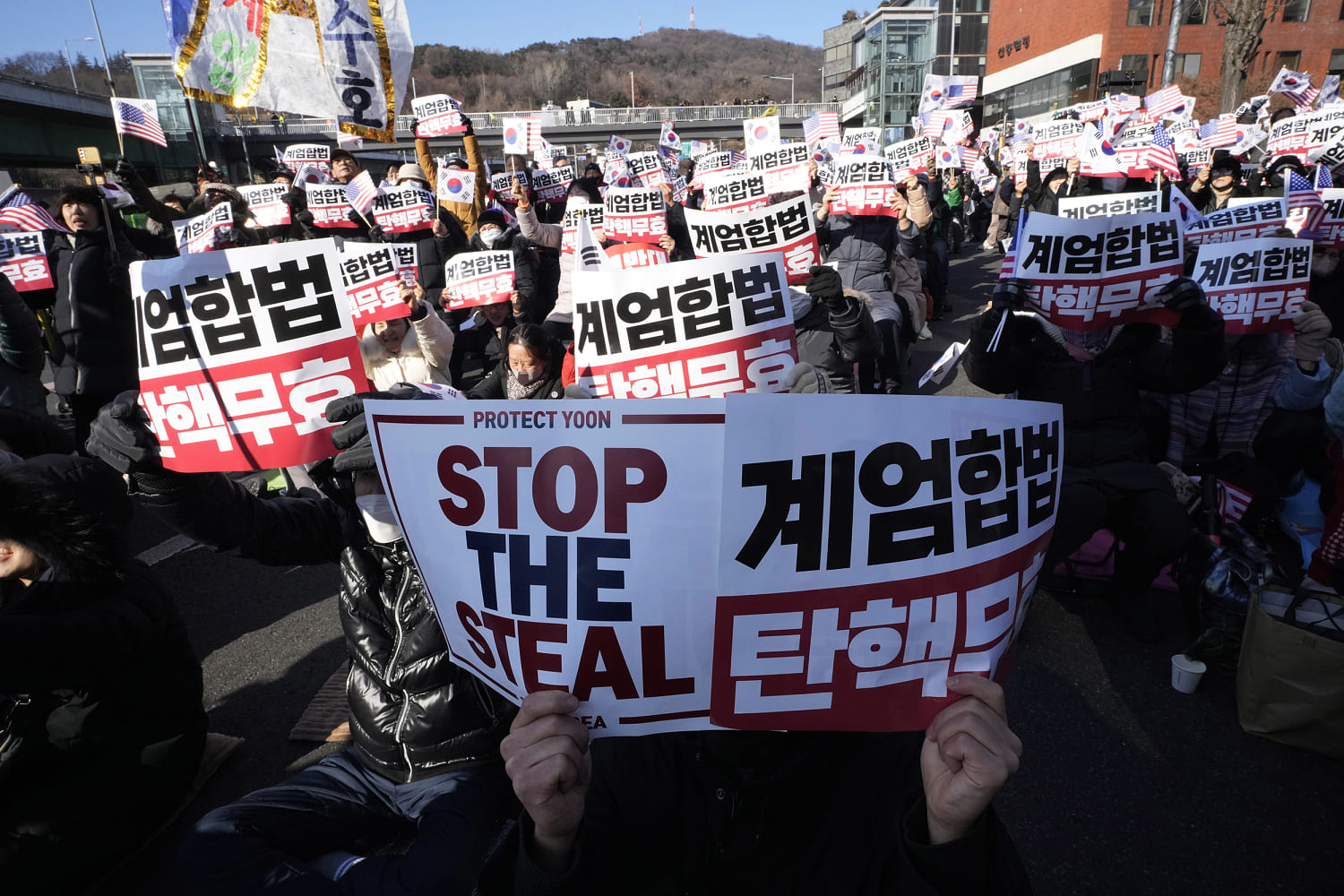 Supporters of impeached South Korean president find inspiration in Trump