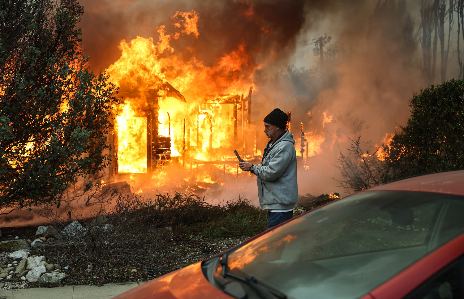 Families flee Palisades Fire with prized possessions and minutes to spare