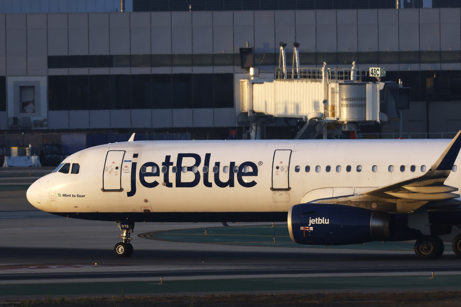 Passenger arrested after allegedly opening emergency door of plane at Boston airport