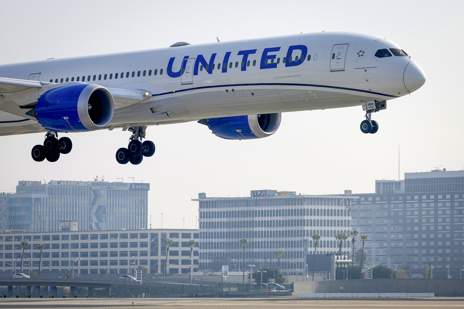 Former United Airlines employee called anti-Asian slurs and assaulted on job, settlement says