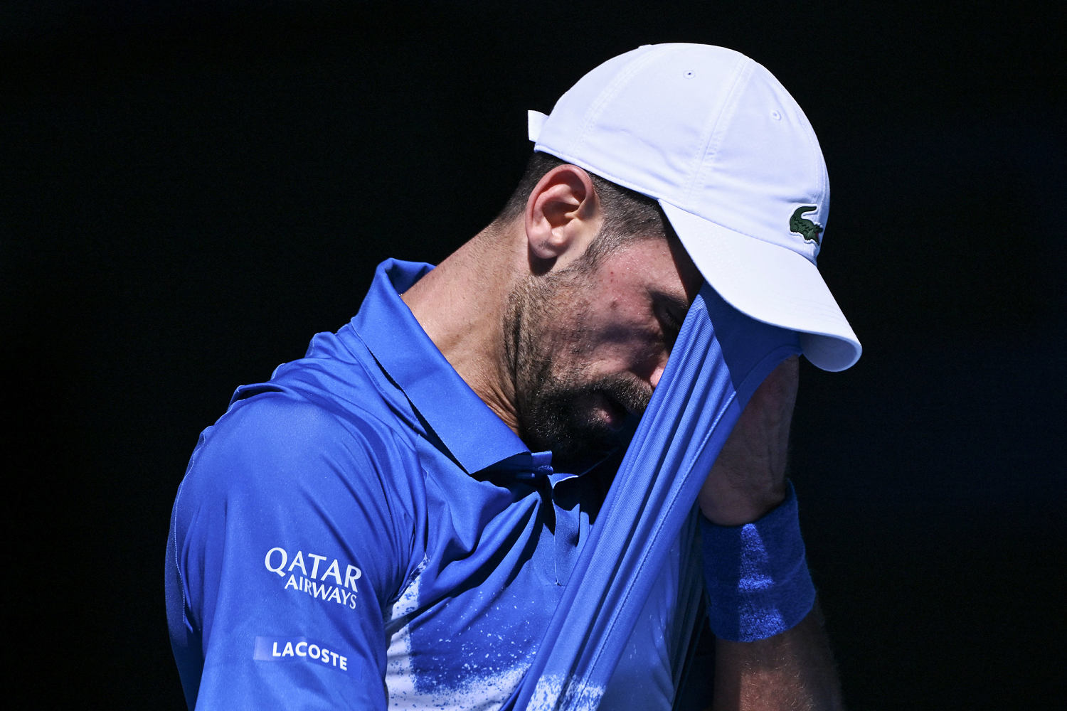 Injured Novak Djokovic quits mid-match and walks off to boos, putting Alexander Zverev in the Australian Open final