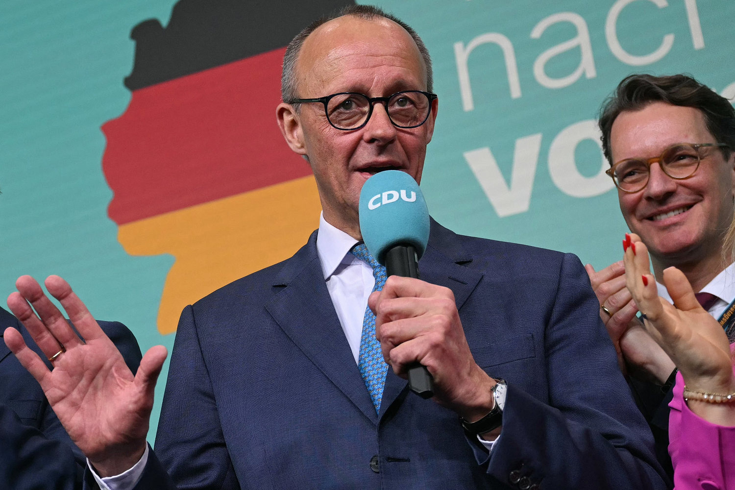 Conservatives win German election while far-right party surges to second place