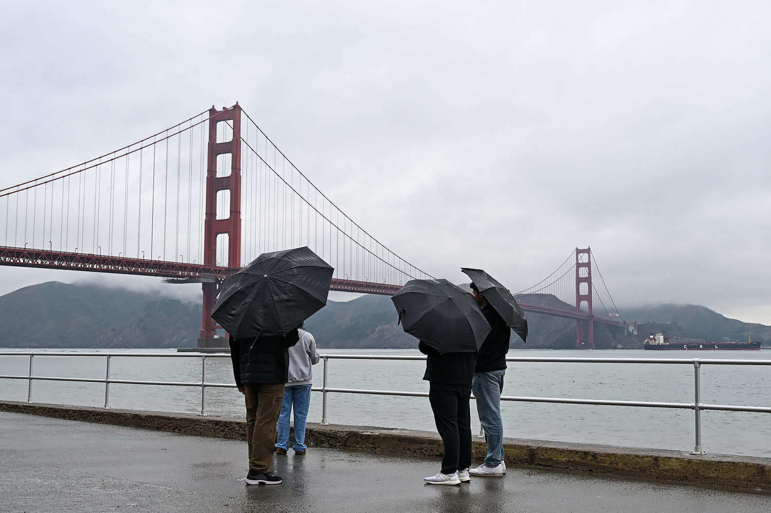 California flood watch raises risk of mudslides days after wildfire containment