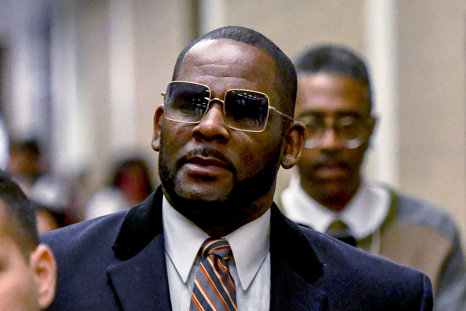 R. Kelly accusers file petition seeking $9M singer still owes