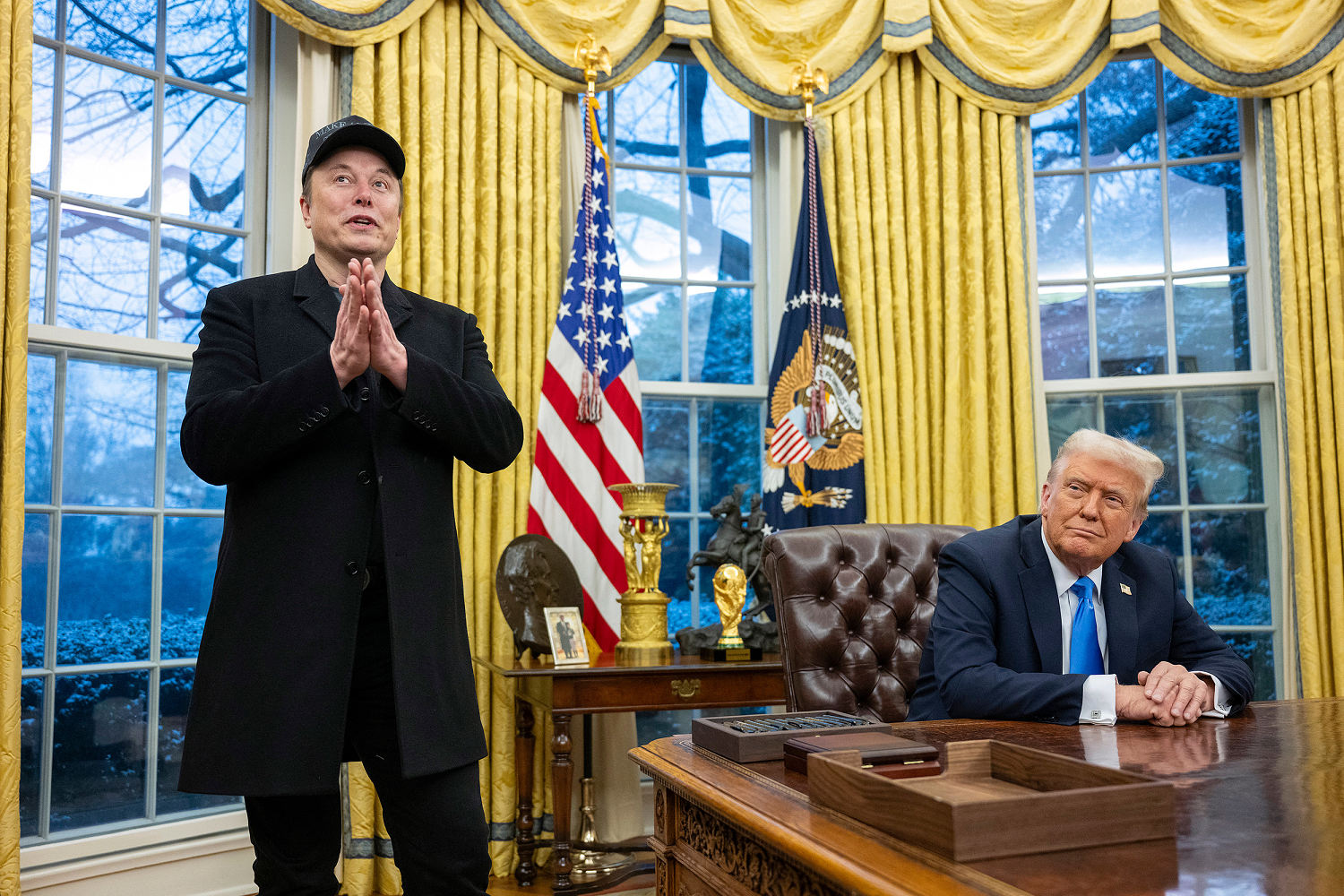 With Elon Musk watching, Trump says he's giving DOGE even more power