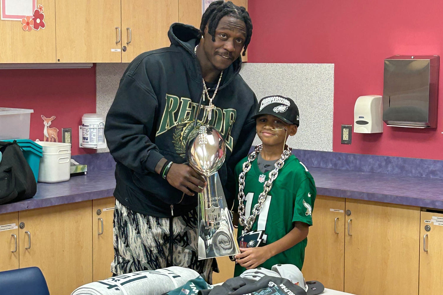 Eagles star A.J. Brown visits 10-year-old who shielded sister in Philadelphia plane crash