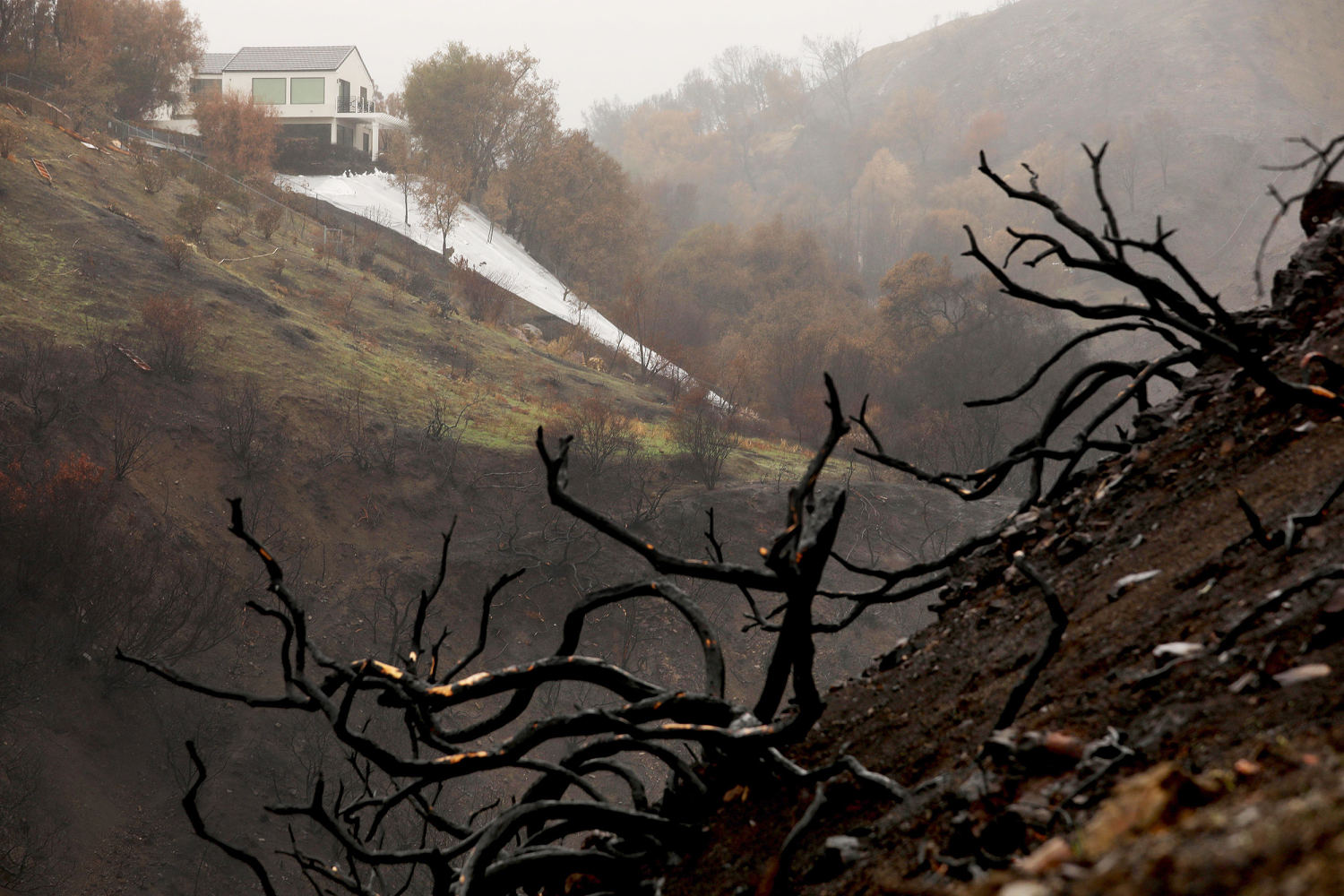 Thousands told to evacuate in L.A. as storms raise fears over burn scars and debris flow