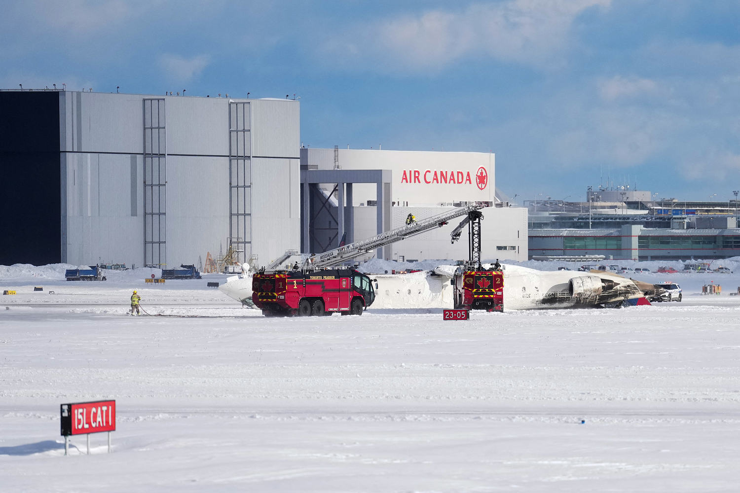 15 injured after Delta plane overturns during landing at Toronto airport