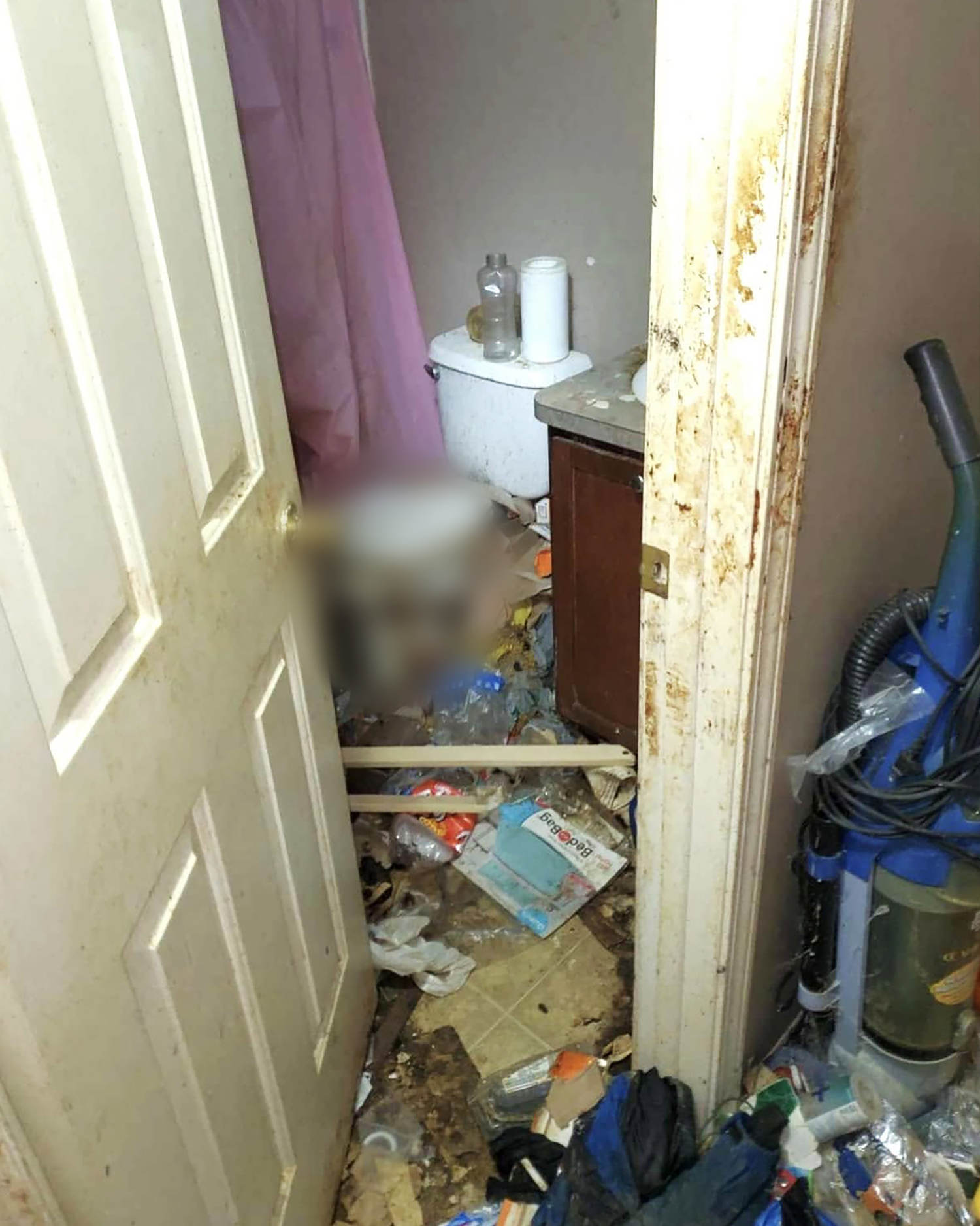 Michigan children found living alone in squalor after mom abandoned them