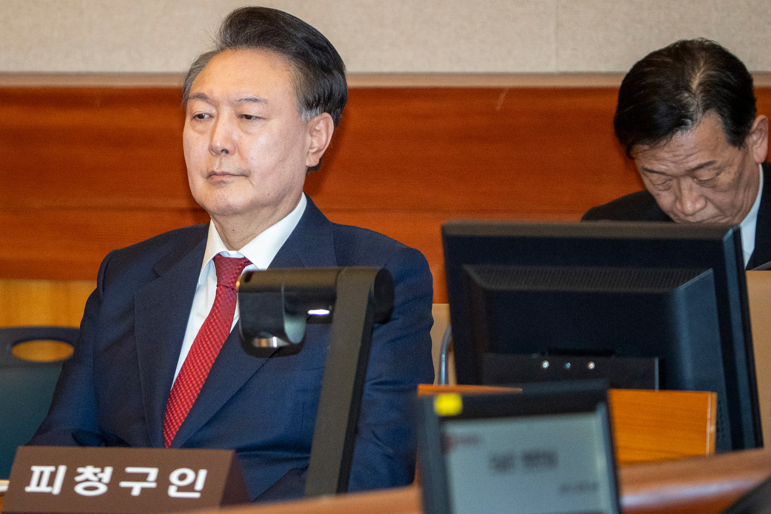 Yoon appears in 2 different South Korean courts while defending his martial law decree