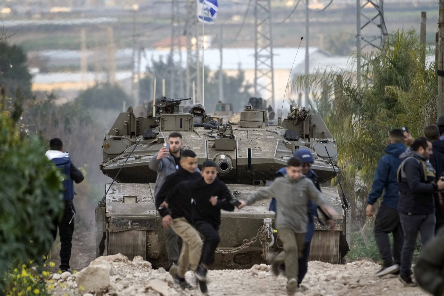 Israel sends tanks into West Bank for first time in decades, says fleeing Palestinians can’t return