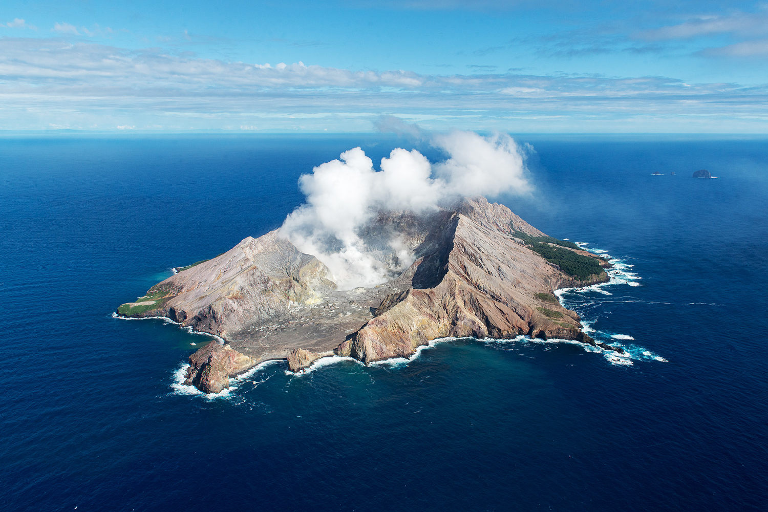 Judge overthrows conviction of owners of New Zealand island where 22 died in volcanic eruption