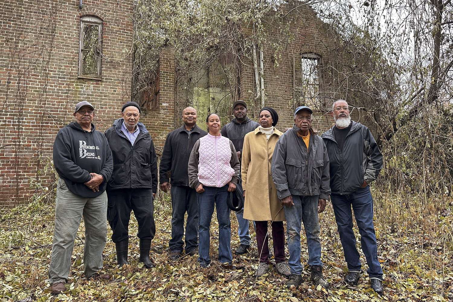 Black graves are being moved to make way for an industrial park, drawing a mix of emotions