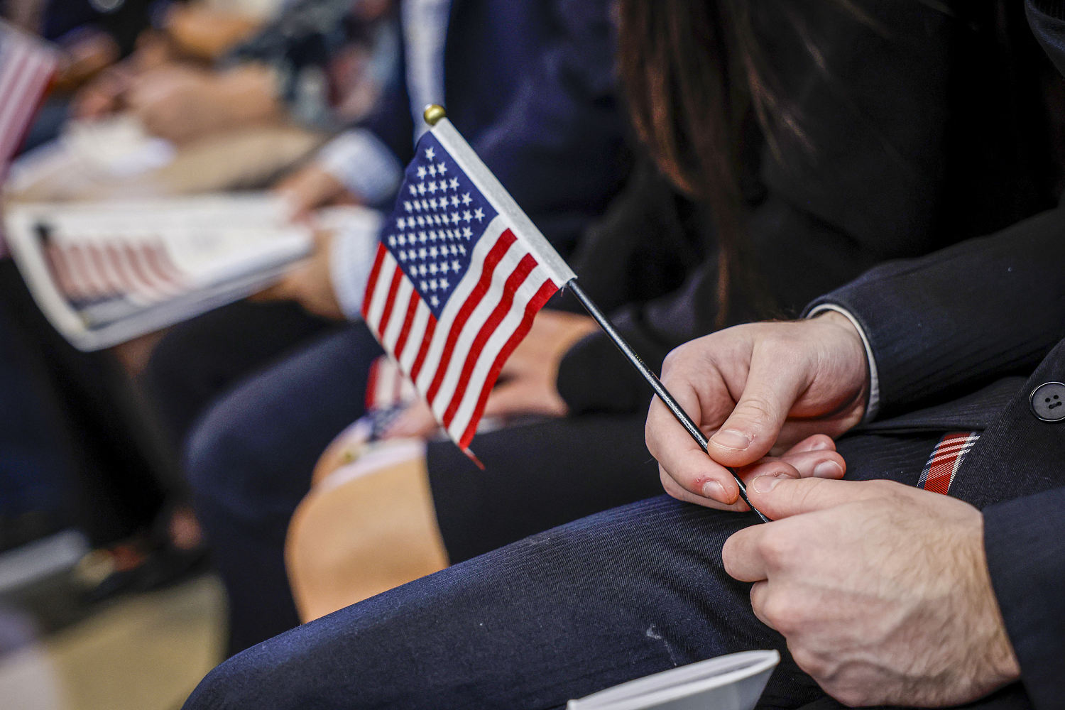 Freeze on funding to help green card holders get citizenship stirs uncertainty