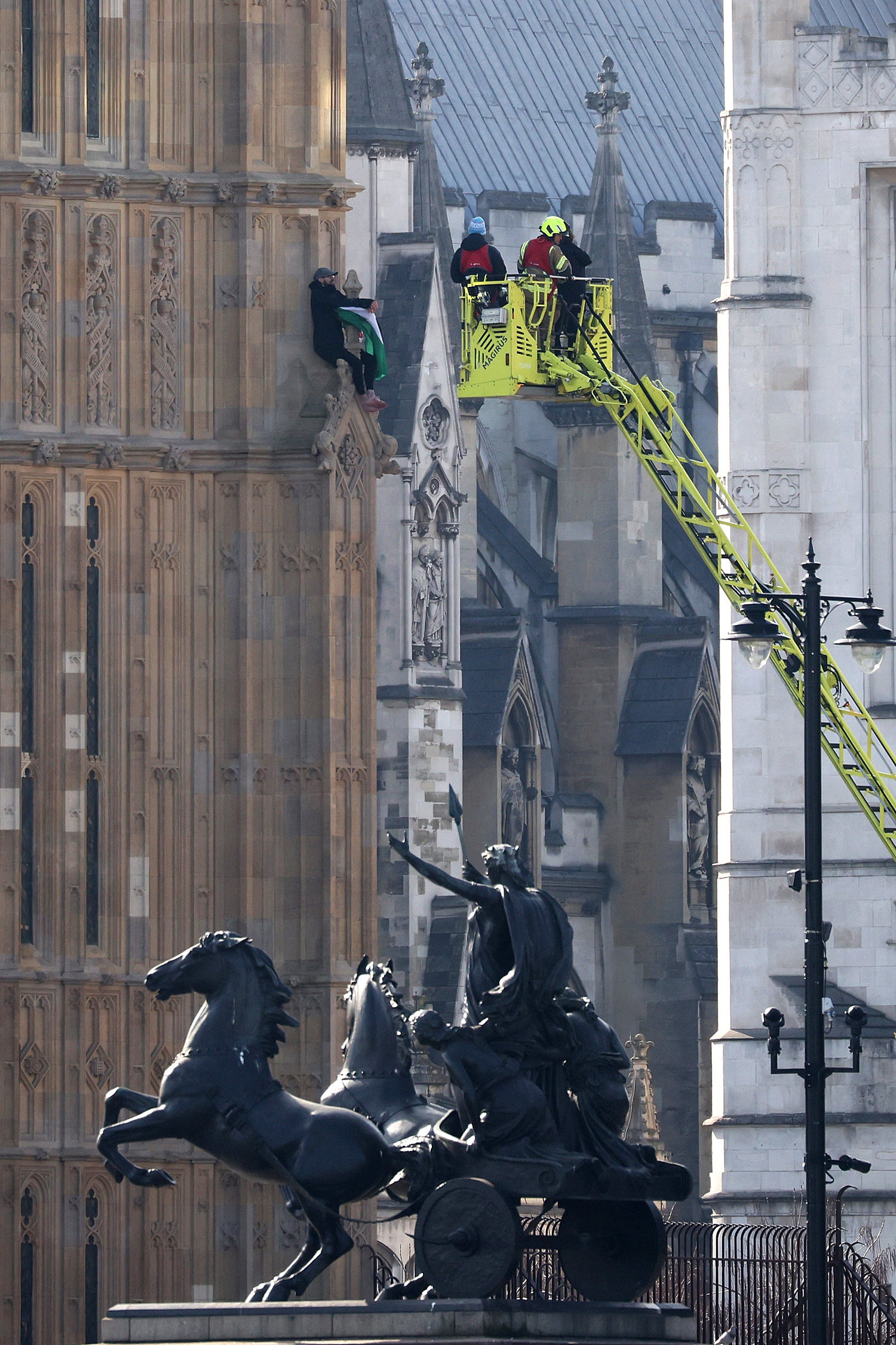 A man with a Palestinian flag climbed London’s Big Ben tower and refused to come down