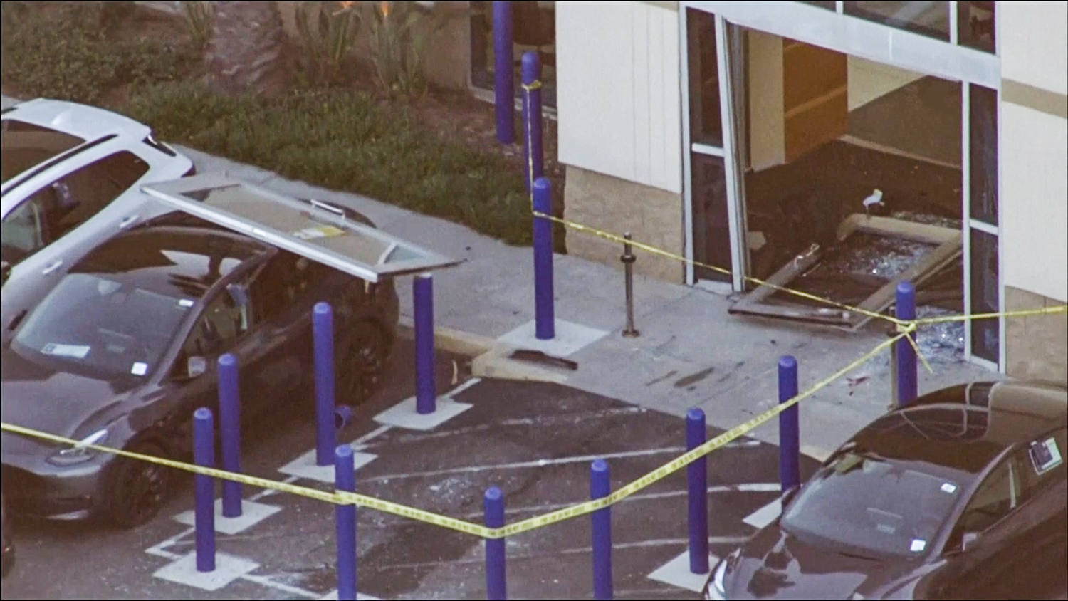 At least 8 injured after customer rams into CarMax store in California