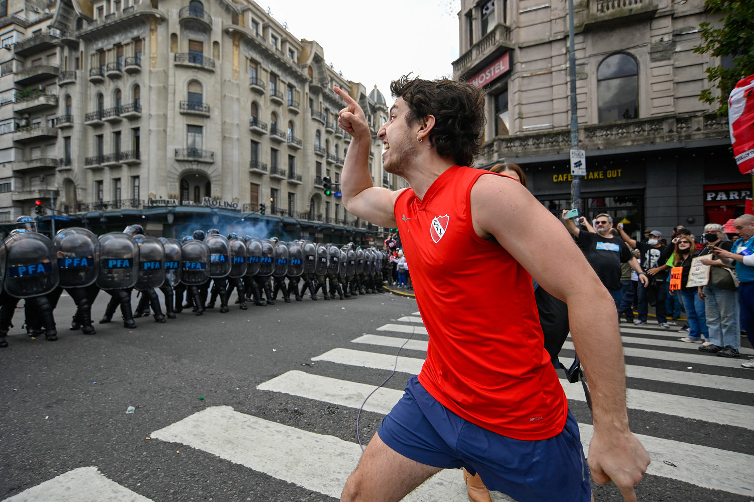 Police battle unlikely combination of retirees and soccer hooligans in Argentina riots