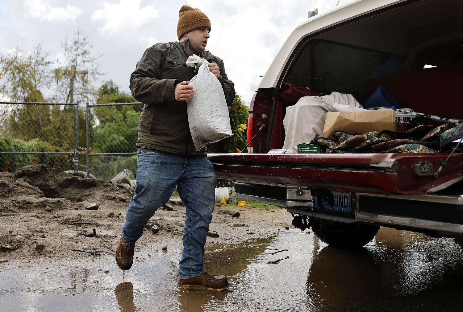 LA faces flooding and power outages from heavy rain as burn scar areas told to evacuate