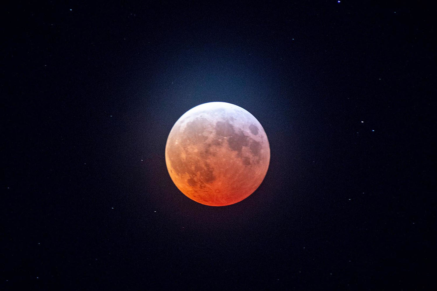 A total lunar eclipse made its way across the U.S. Thursday night