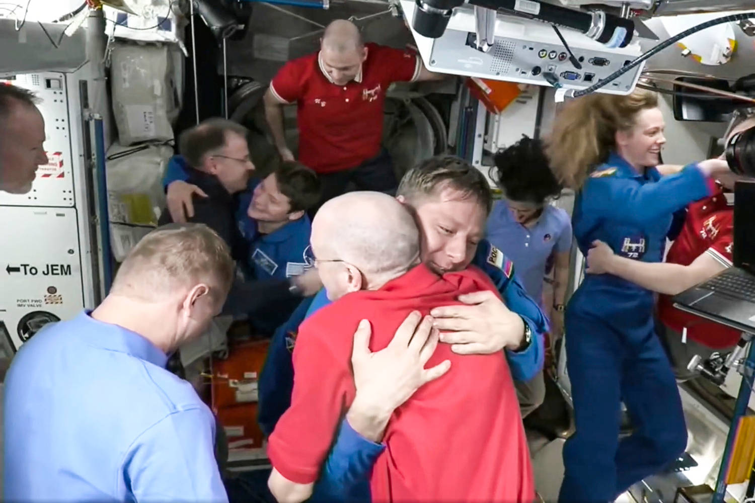 NASA's stuck astronauts welcome their newly arrived replacements to the space station