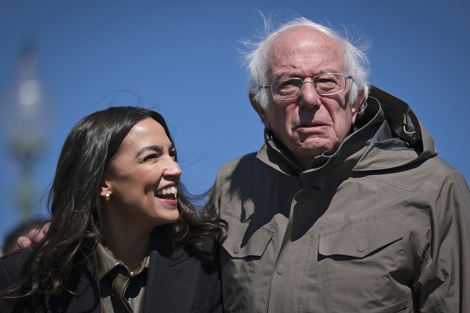 Alexandria Ocasio-Cortez and Bernie Sanders rally Democrats, calling for a party that 'fights harder'