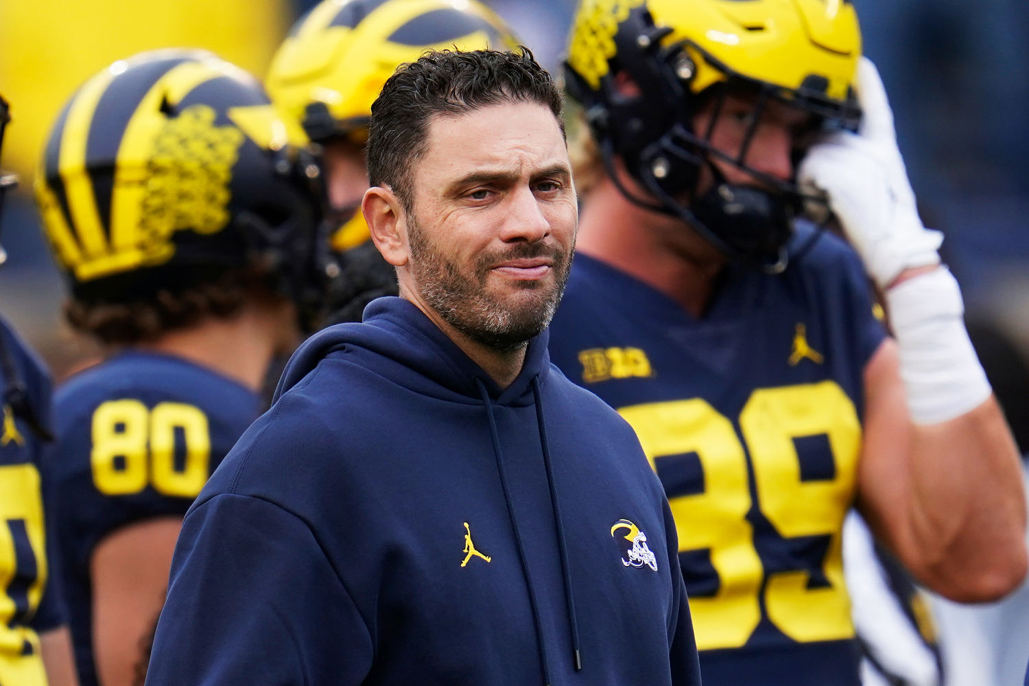 Two former Michigan athletes allege intimate images were stolen by ex-football coach