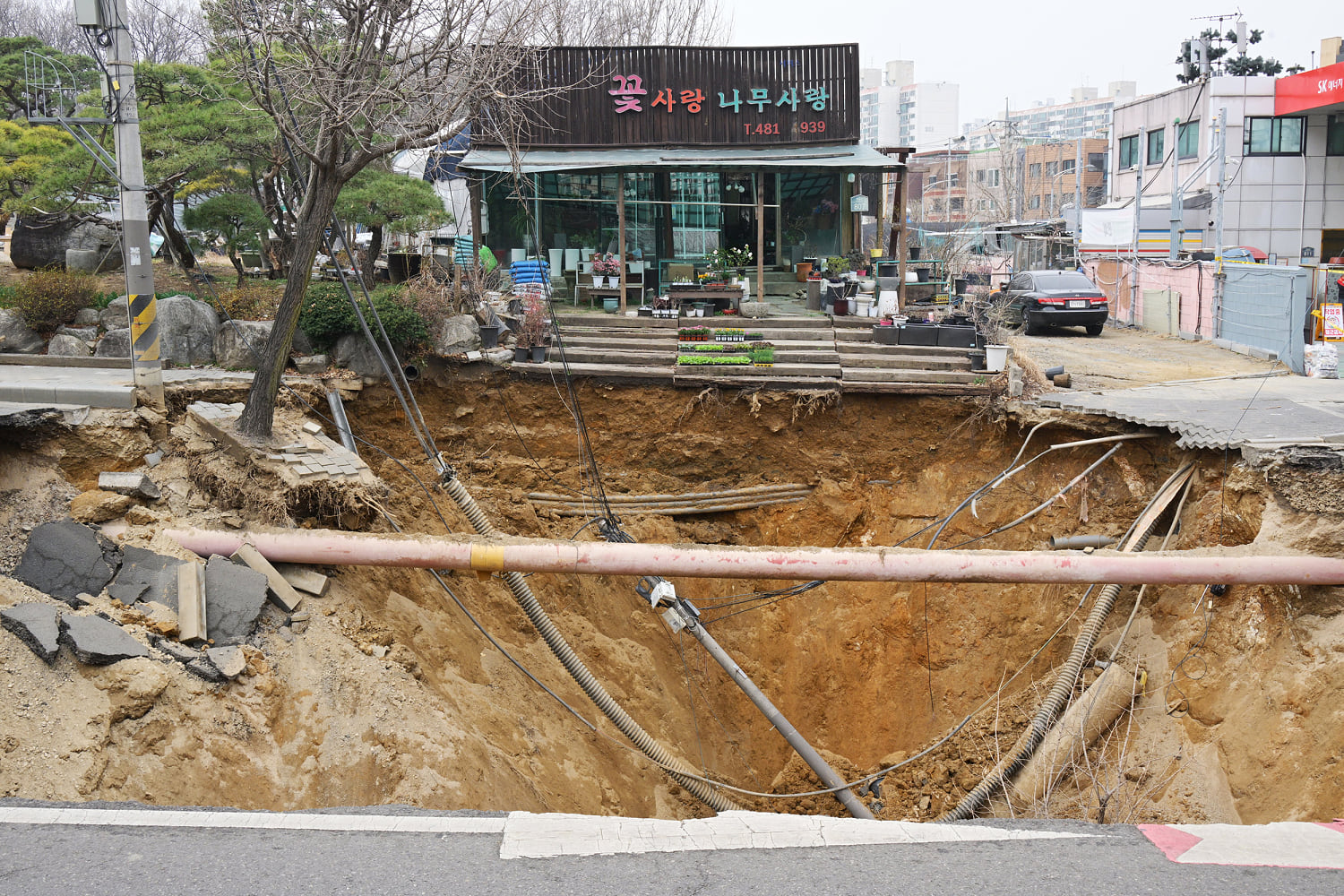 Motorcyclist dies after being swallowed by sinkhole in South Korea