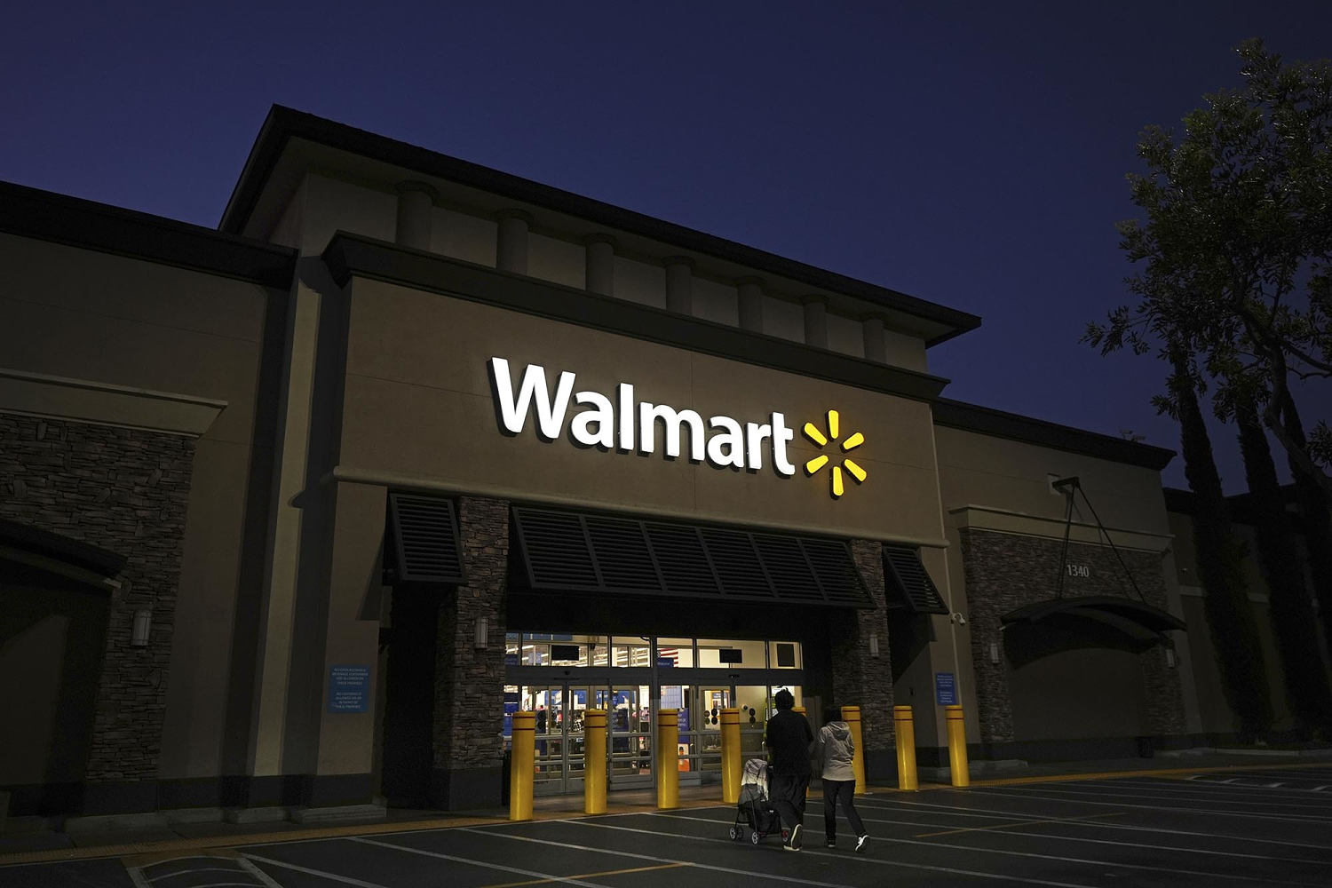 Trump takes on Walmart over tariff price hikes, setting up potential showdown with retail industry