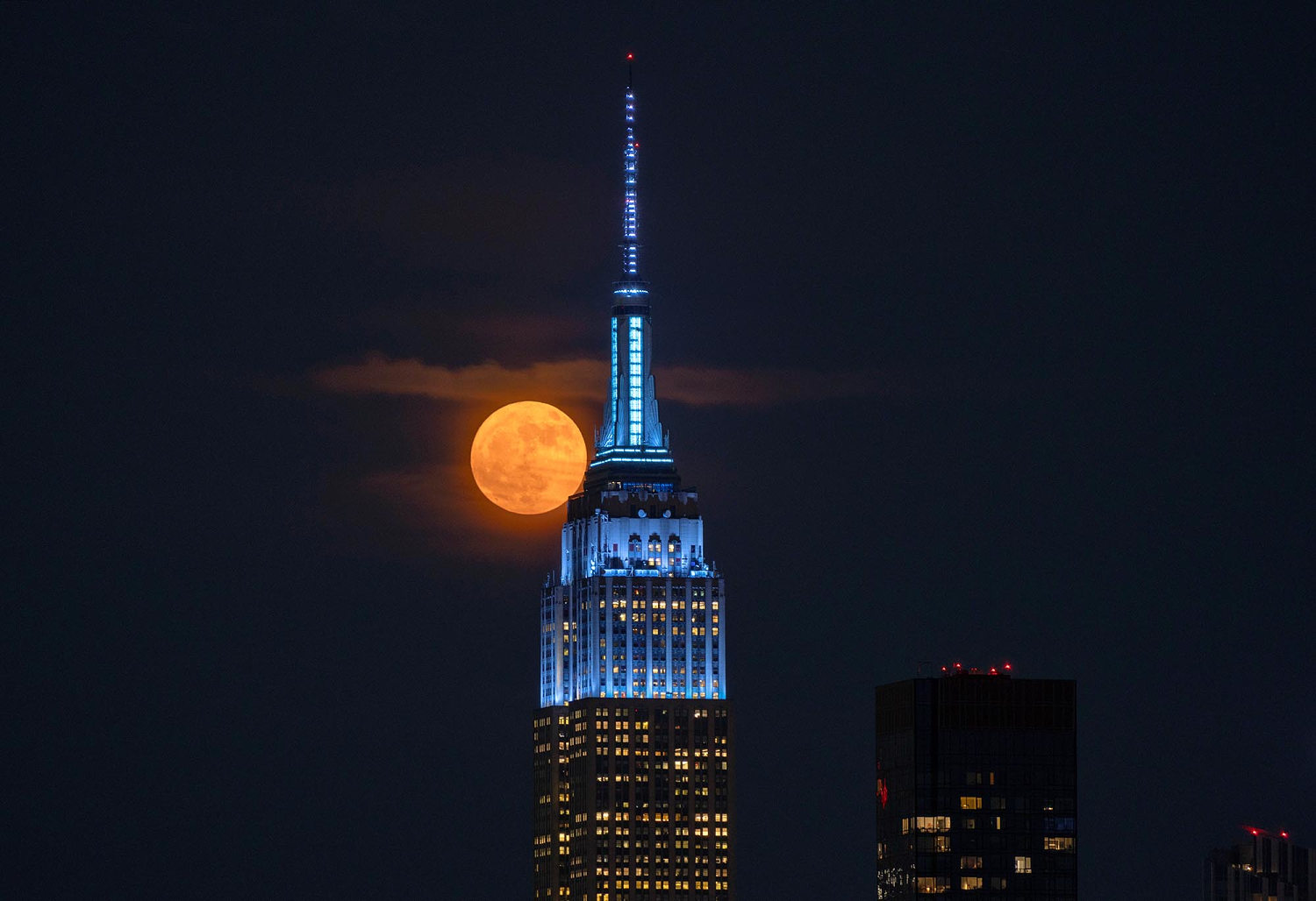 See stunning images of June's Strawberry Moon