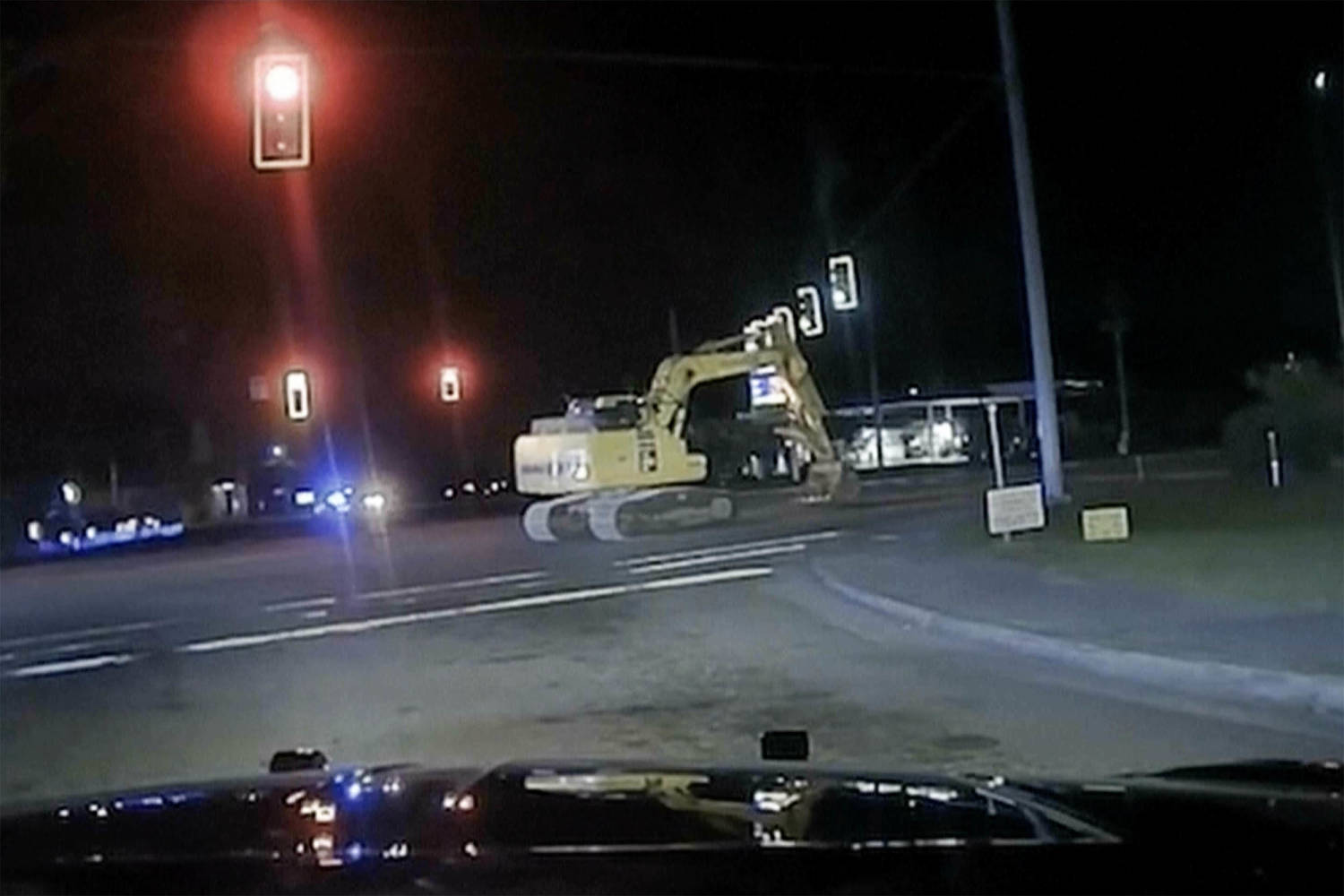 Not-so-hot pursuit of burglary suspect sees police cars chase tractor excavator at walking pace