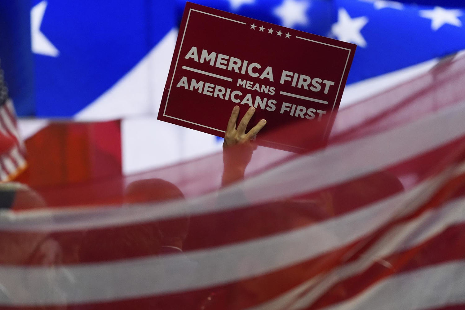 Trump tries to redefine ‘America First’ in the face of MAGA backlash