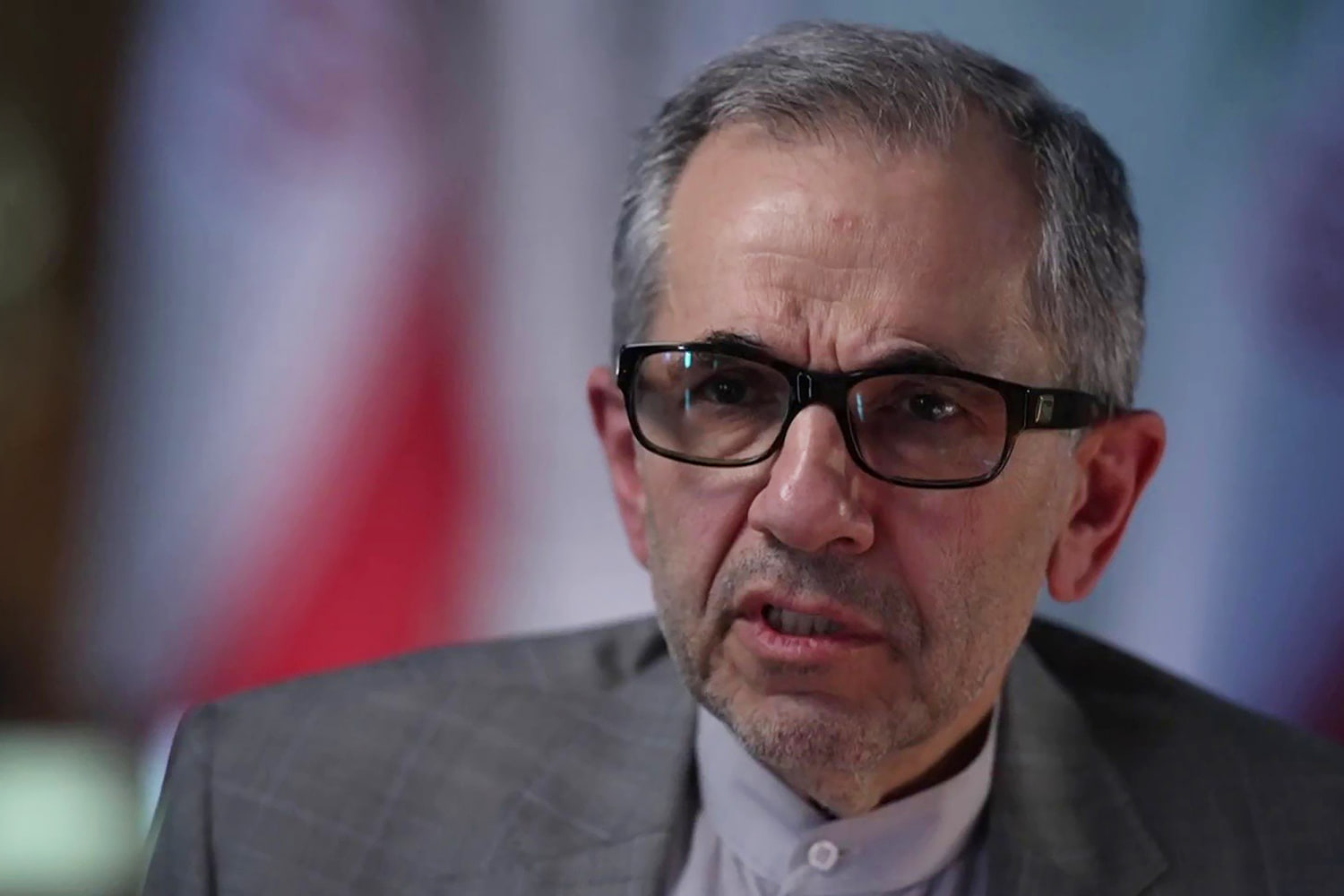Iran won't retaliate against U.S. — but will keep enriching uranium, top official says