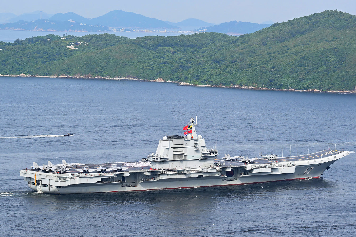 China's first homemade aircraft carrier sails into Hong Kong in a show of military prowess