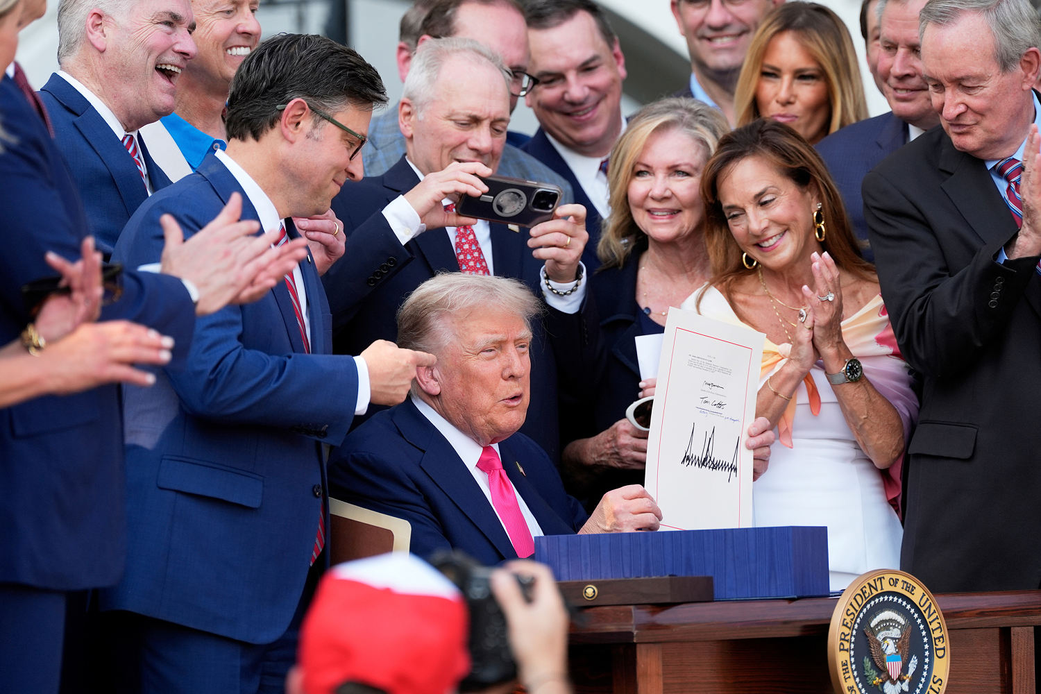 Trump triumphantly signs bill that shows his hold on the GOP