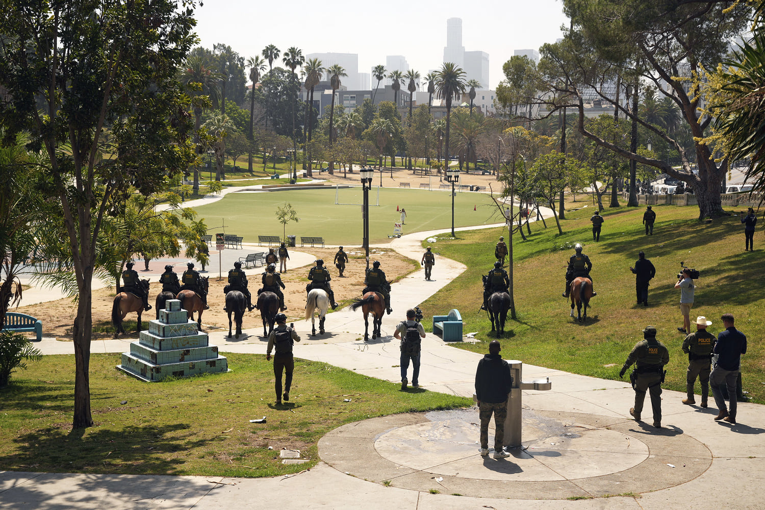 Troops and federal agents briefly descend on LA's MacArthur Park in largely immigrant neighborhood