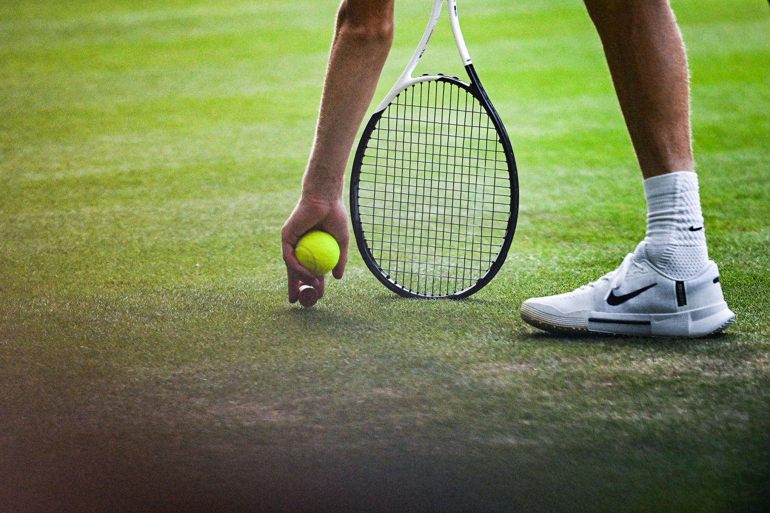 In Wimbledon final, Jannik Sinner had to deal with Carlos Alcaraz — and a flying Champagne cork