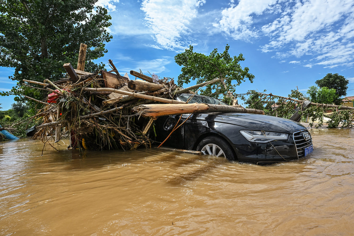 Flooding kills at least 38 as Beijing region gets almost a year's worth of rain