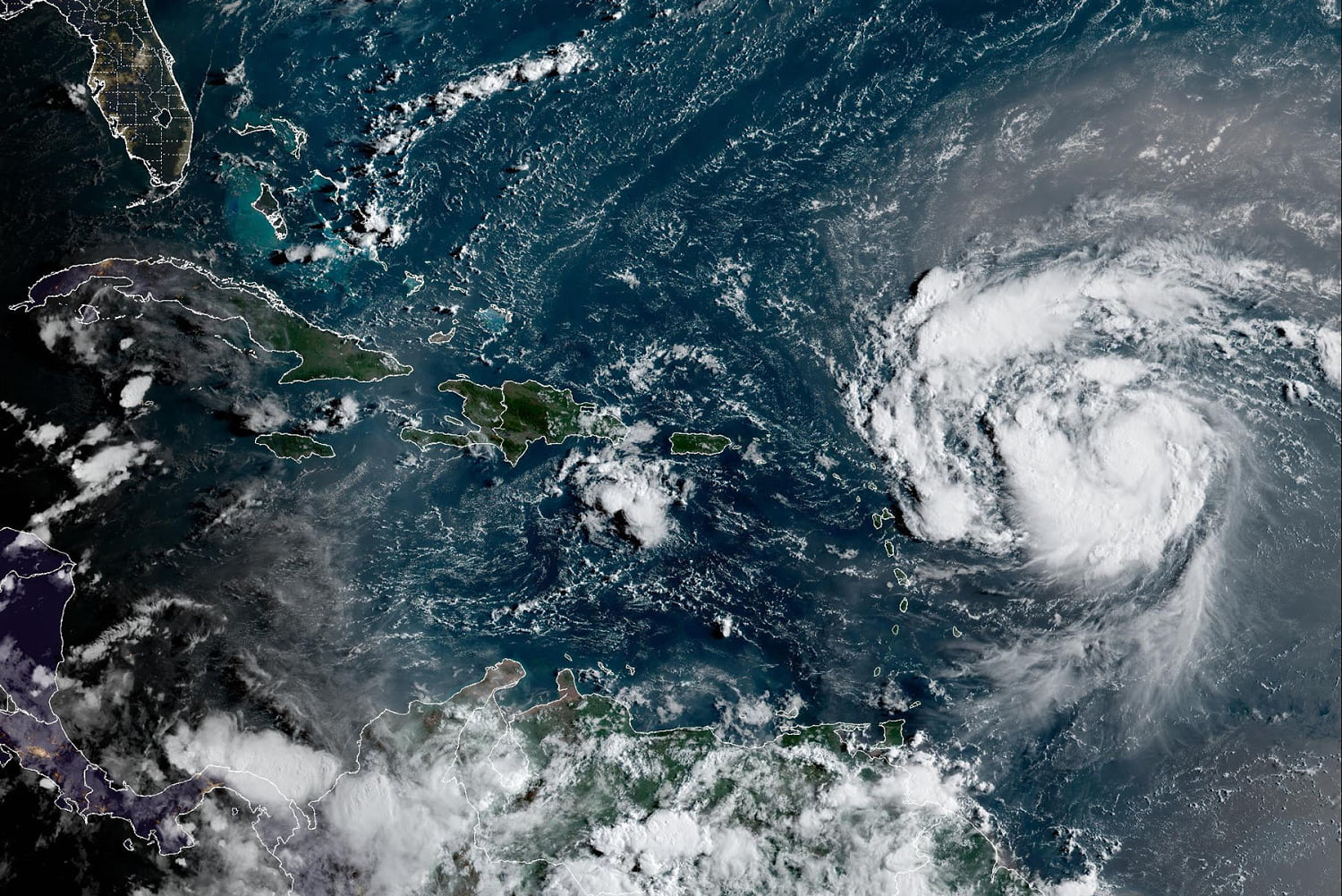 Tropical Storm Erin strengthens into first Atlantic hurricane of 2025 season