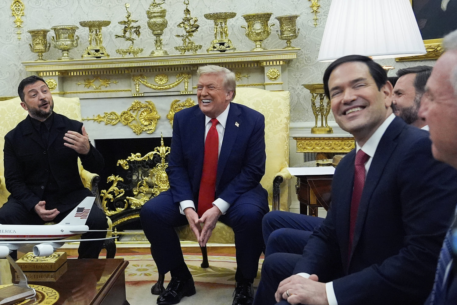 Suited and full of praise, Ukraine and allies woo Trump away from Putin