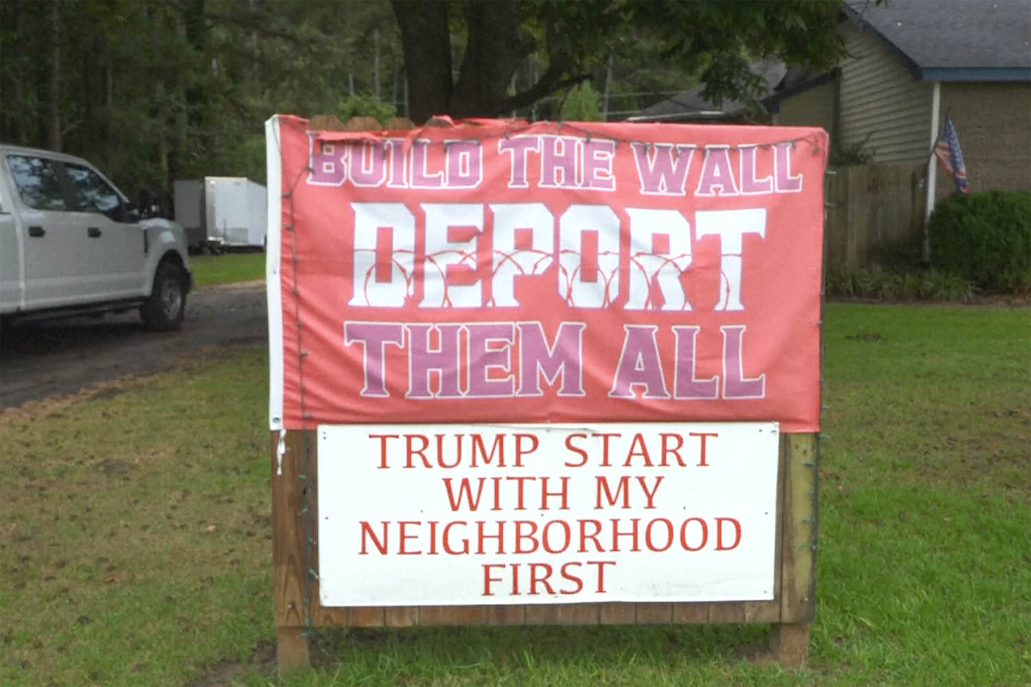 Man living next to Hispanic-owned business puts up sign calling to deport his neighbors